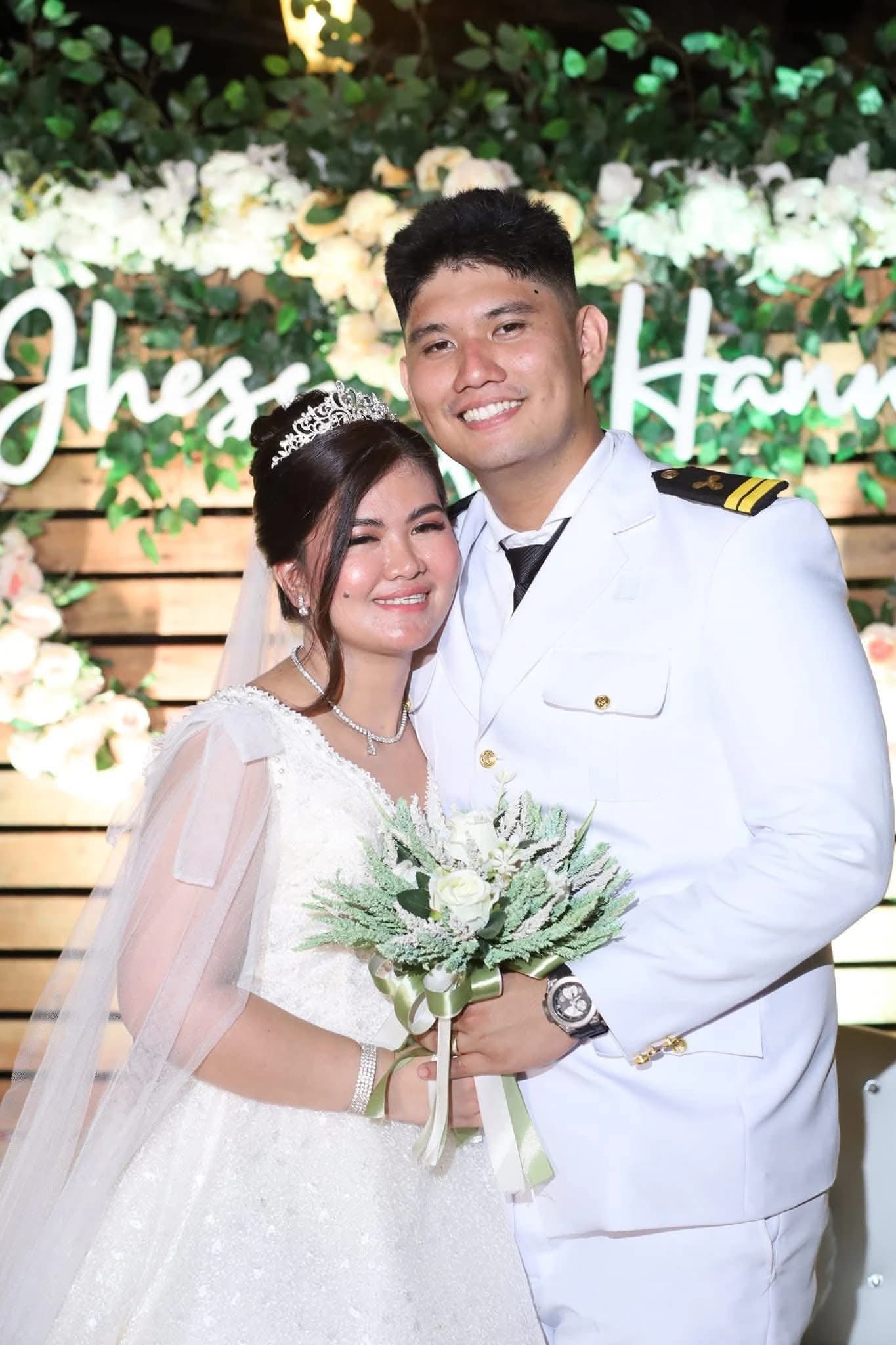 Bride and groom in coordinated white wedding attire