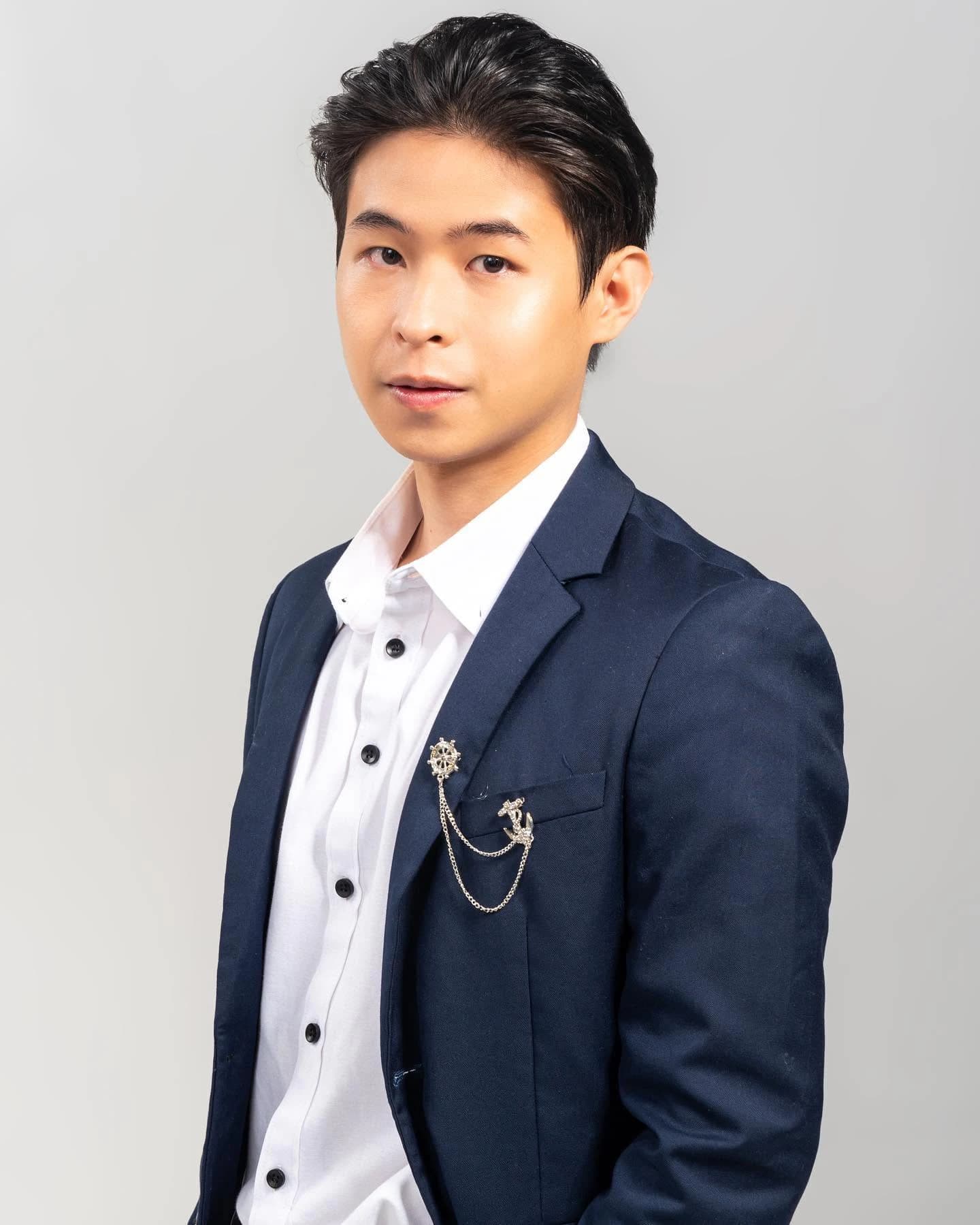 Male portrait with polished formal grooming and makeup