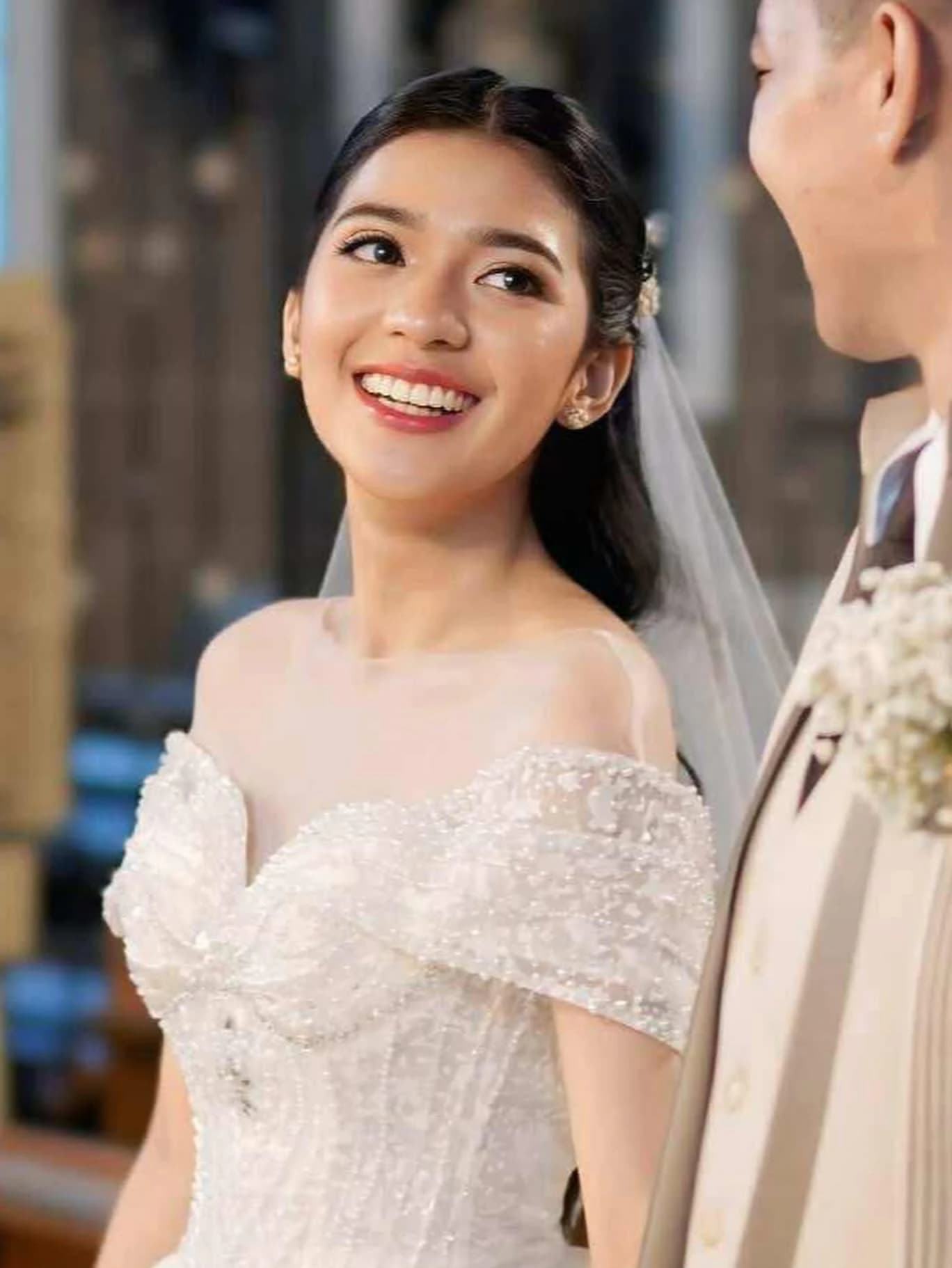 Crissa Makeup Artistry — bride ceremony smiling closeup
